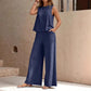 Completo da donna a due pezzi in tinta unita, composto da gilet con scollo rotondo e pantaloni a gamba larga