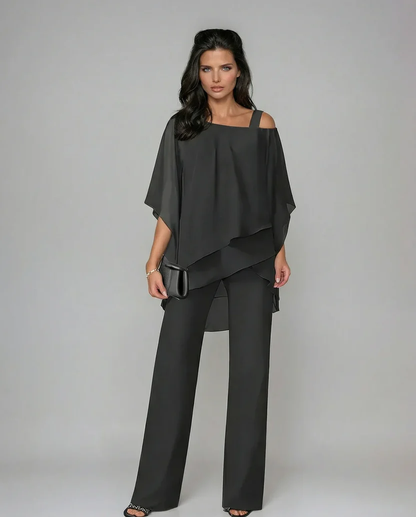 ⏳Sconto a tempo limitato del 50%⏰Top in chiffon irregolare da donna e pantaloni a zampa 2 pezzi👚👖