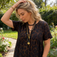 Abito lungo da donna con scollo a V e stampa leopardata