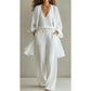 Elegante completo composto da pantaloni a gamba larga e cardigan