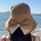 Cappello da donna con fiocco, tesa larga, per proteggersi dal sol