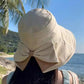Cappello da donna con fiocco, tesa larga, per proteggersi dal sol