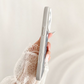 Custodia per cellulare con contrasto cromatico magnetico